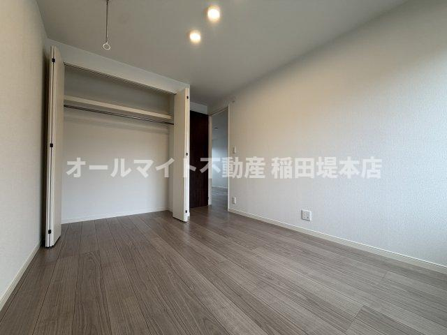 稲城市坂浜のアパートの洋室