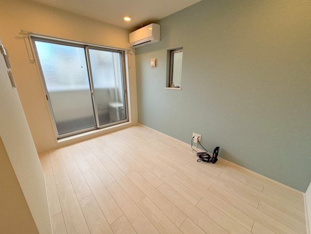 ハーモニーテラス三津屋南の洋室