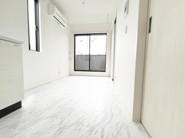 熊本市北区楠８丁目のアパートの居間・リビング