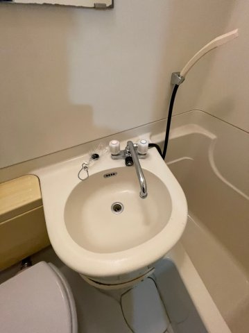 岡住マンションの洗面所|※写真は別の部屋のものです。