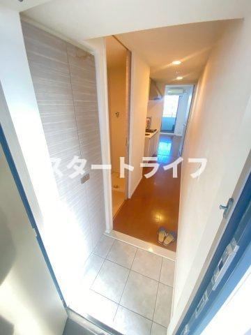 大阪市淀川区十三東１丁目の賃貸マンションの玄関