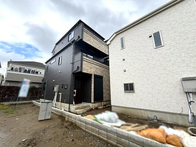市川市原木３丁目８５２番の前面道路含む現地写真|D号棟の写真。