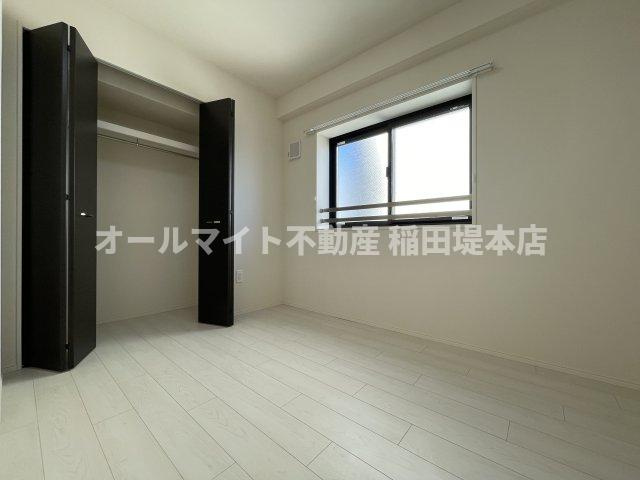 多摩市鶴牧１丁目の賃貸マンションの寝室
