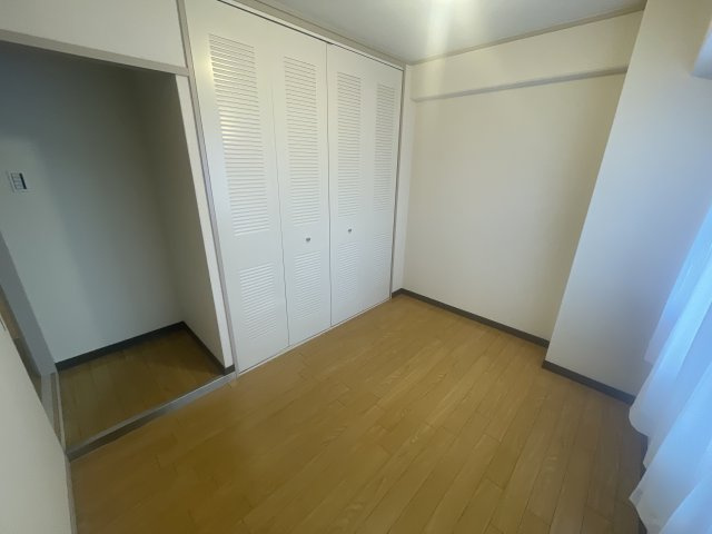 エクセリィ桂の洋室