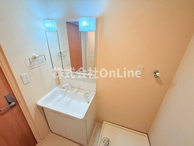八尾市明美町２丁目の賃貸マンションの洗面所