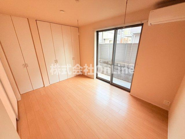 八尾市明美町２丁目の賃貸マンションの洋室