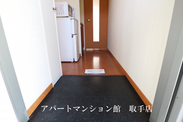 レオパレスＳＵＮＲＩＳＥ南新木の玄関