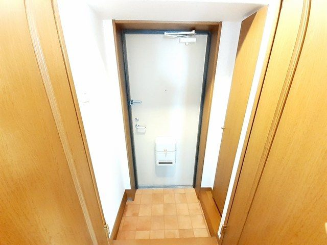 プレジデント姪浜駅前の玄関
