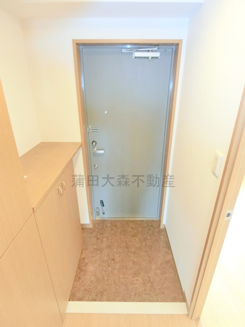 コスモリード池上の玄関