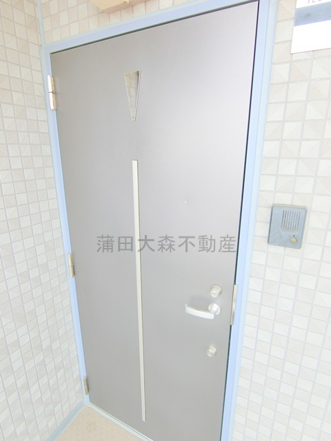 コスモリード池上の玄関