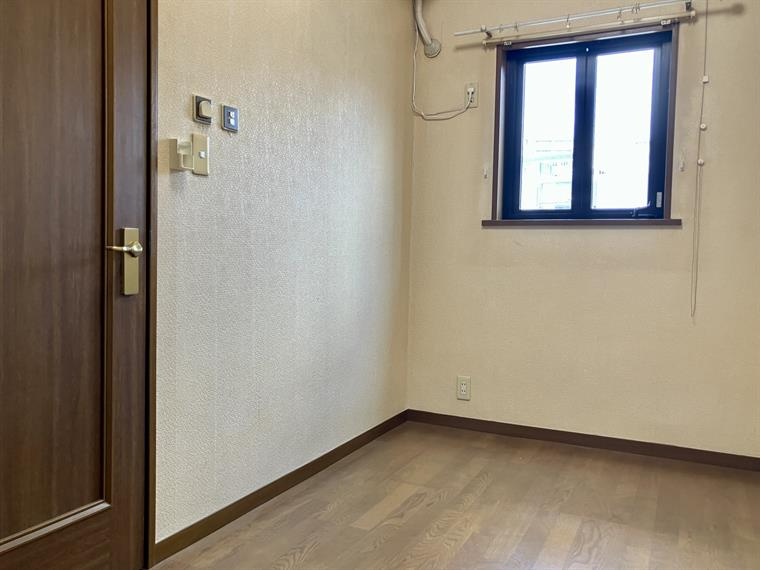 巣鴨戸建の寝室|落ち着いた色調の寝室です