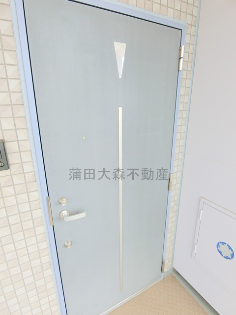 コスモリード池上の玄関