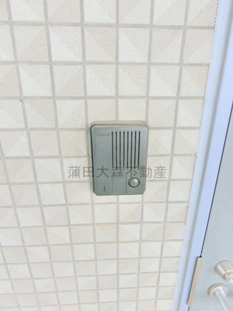 コスモリード池上の玄関