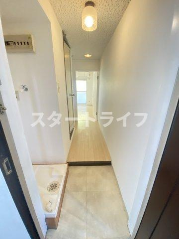 大阪市淀川区三国本町３丁目の賃貸マンションの玄関