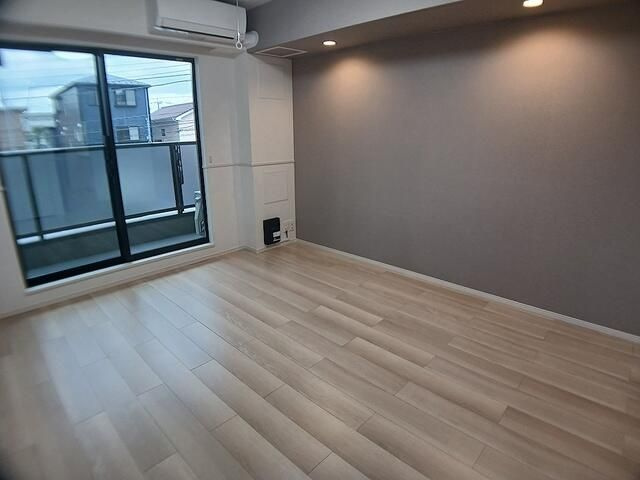 ヒカルサ東川口の居間・リビング