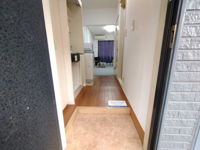 レオパレスＡＮＮＥＸＥＧＡＷＡの玄関|写真は備品設置部屋です