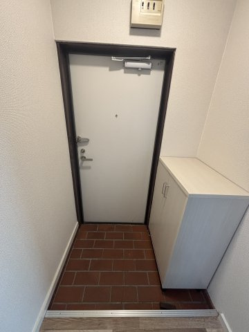 東園田マンション（東園田町5丁目）の玄関