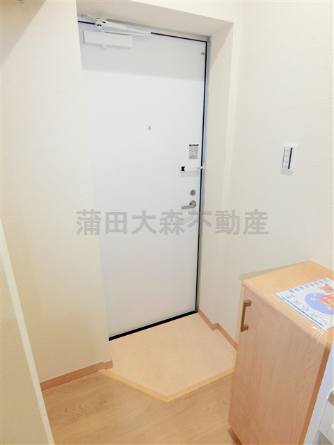 グラシア蒲田本町の玄関