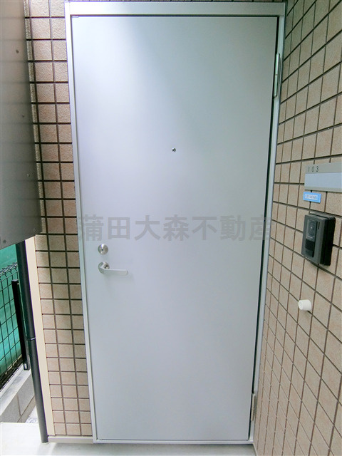 グラシア蒲田本町の玄関