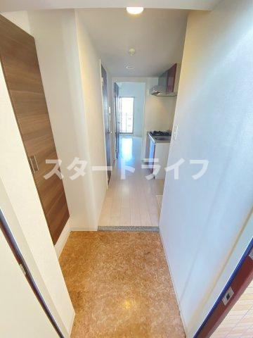 大阪市淀川区十三本町２丁目の賃貸マンションの玄関