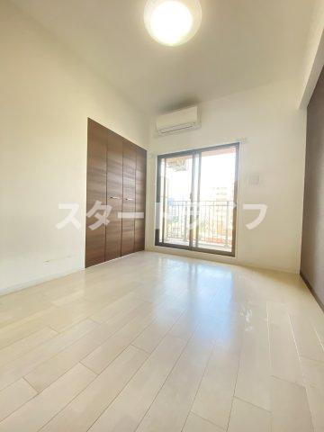 大阪市淀川区十三本町２丁目の賃貸マンションの居間・リビング