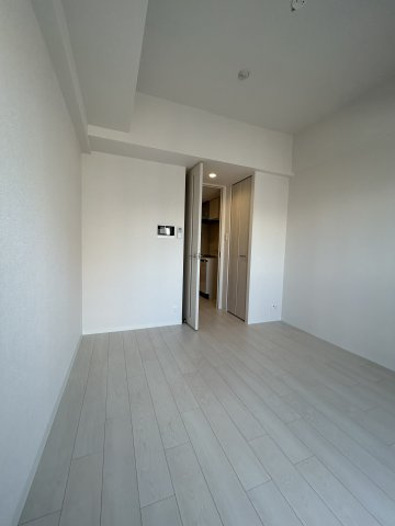 ファーストフィオーレ十三エリオの洋室