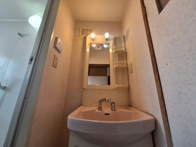 志紀町南住居付倉庫の洗面所