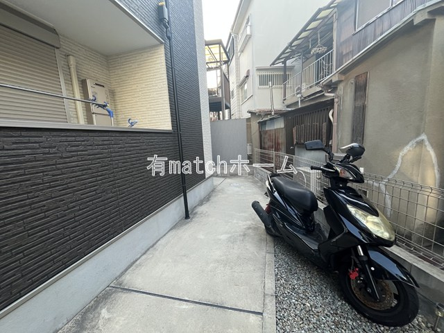 ドムス寝屋川の駐車場