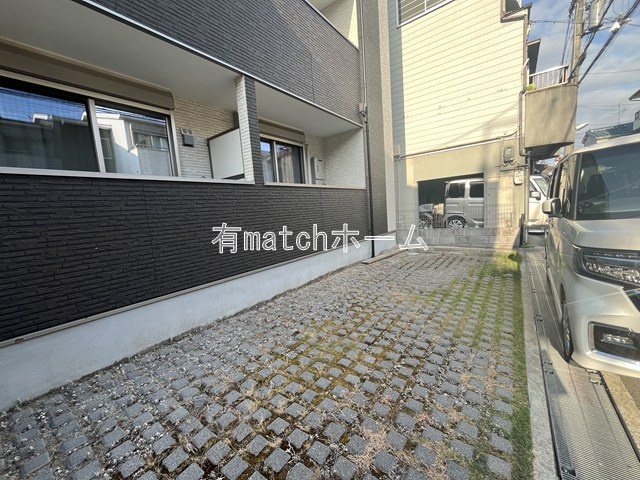 ドムス寝屋川の駐車場
