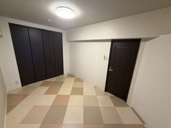 コンフィデンス西本町の寝室