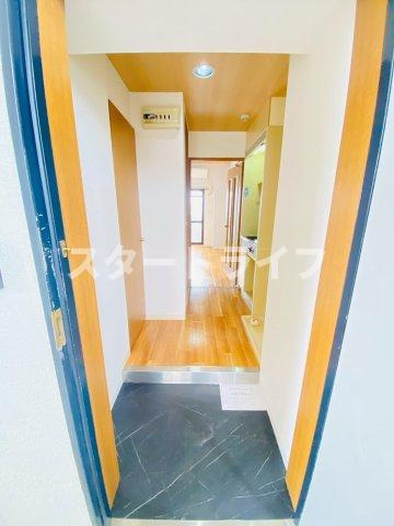 大阪市淀川区西中島１丁目の賃貸マンションの玄関