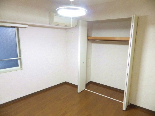 グランドシティ白山の寝室