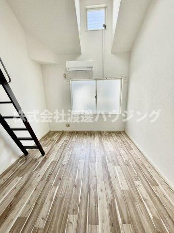 ヴィラ・スリースター尼崎の寝室