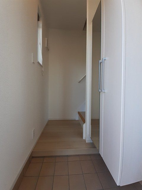 ニューグランポルテＴＳの玄関