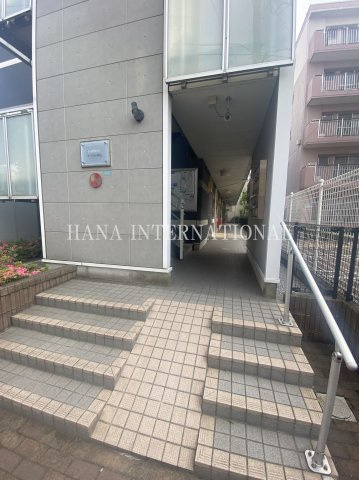 カーサ川口飯塚のエントランス