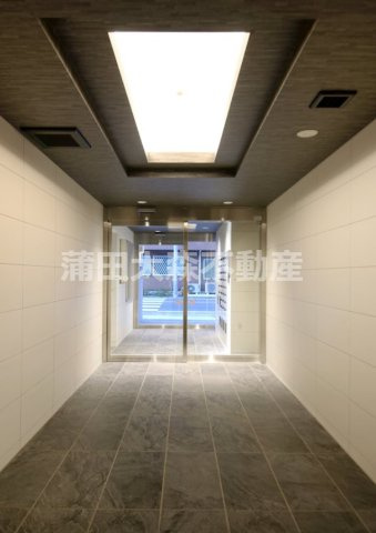 HY's flat 糀谷のエントランス