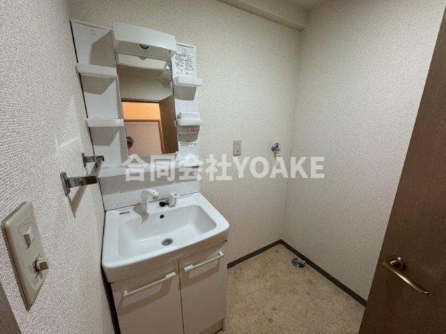 ドリームハイツ南林間の洗面所|別号室の写真となります。現況優先。