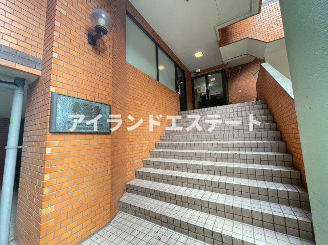 ライオンズマンション太子堂秋栄　室内洗濯機置場　角部屋のエントランス