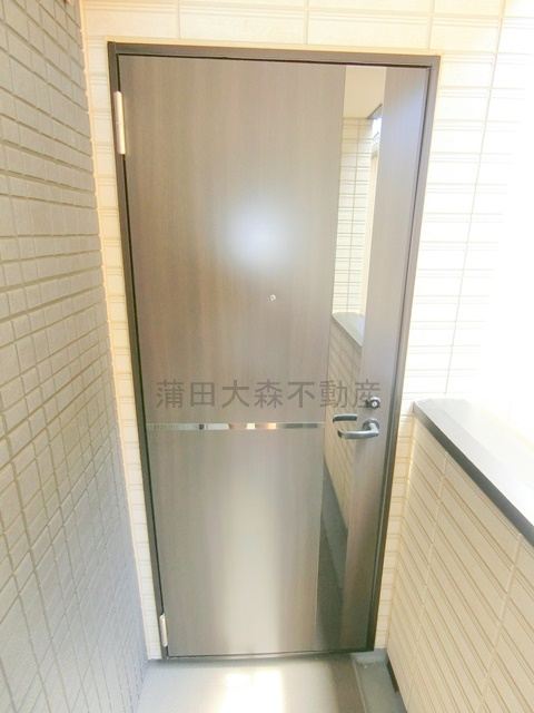ログライフ東六郷の玄関