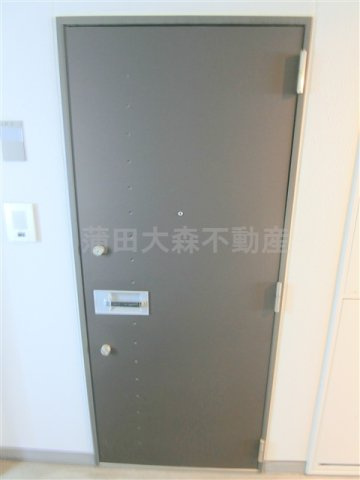 ライジングプレイス蒲田南の玄関