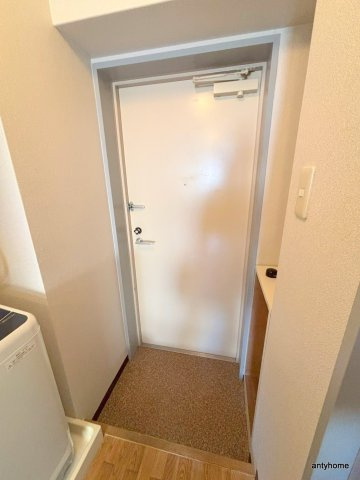 プレリュード江坂　仲介手数料無料の玄関