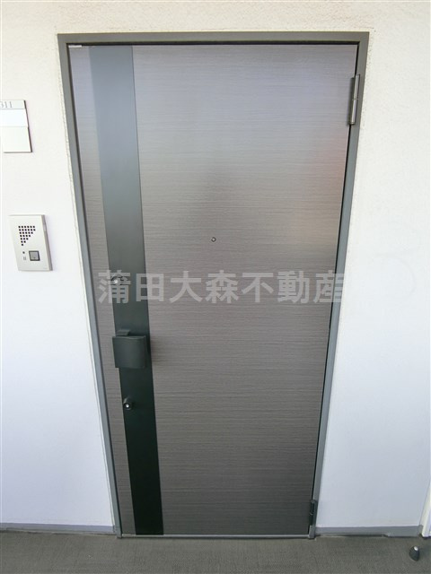 ハーモニーレジデンス池上の玄関