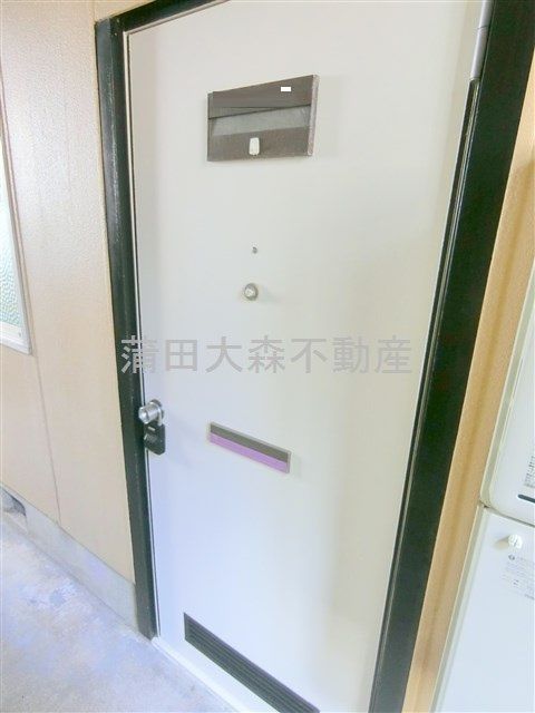 仲六郷ハイツの玄関
