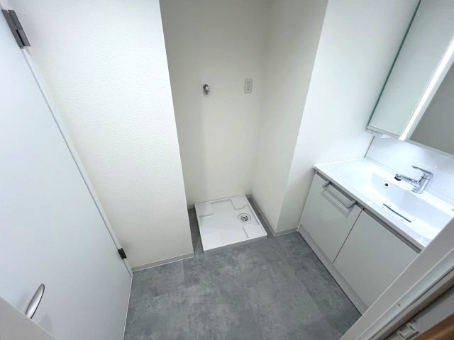 けやき台パーク・ホームズの脱衣所|洗面室です。白を基調としており、清潔感があります。
