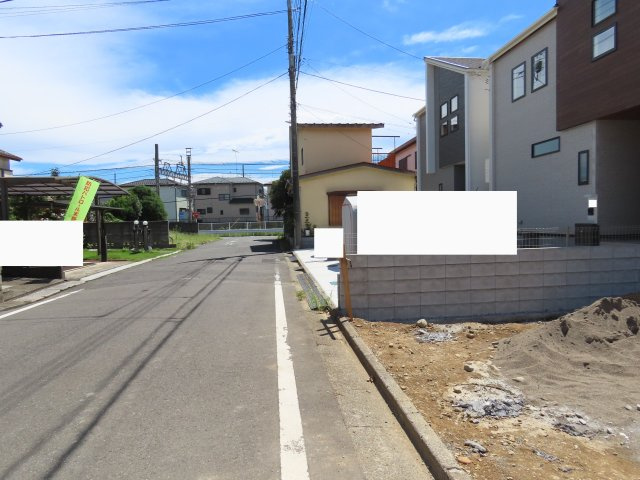 坂戸市溝端町売地の前面道路含む現地写真