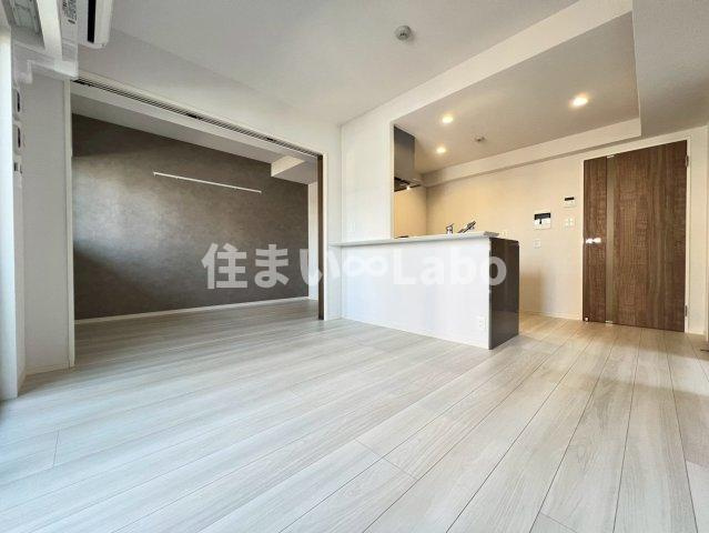  ネストピア福岡空港駅前の居間・リビング
