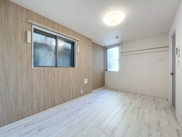 レジデンス梅島の洋室