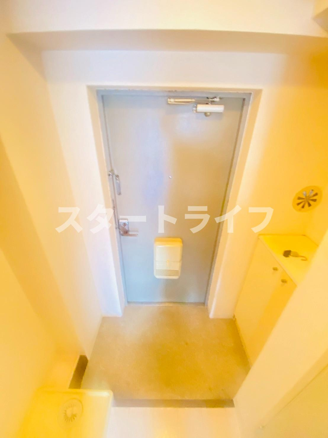 大阪市東淀川区菅原６丁目の賃貸マンションの玄関