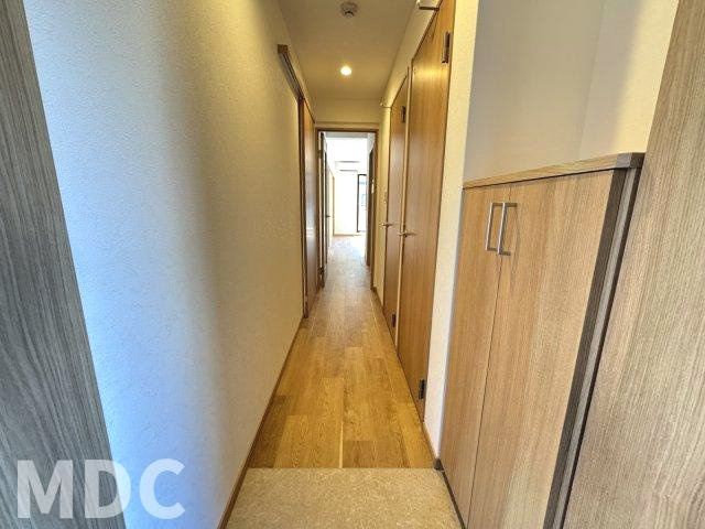 徳島市八万町下福万の賃貸マンションの玄関