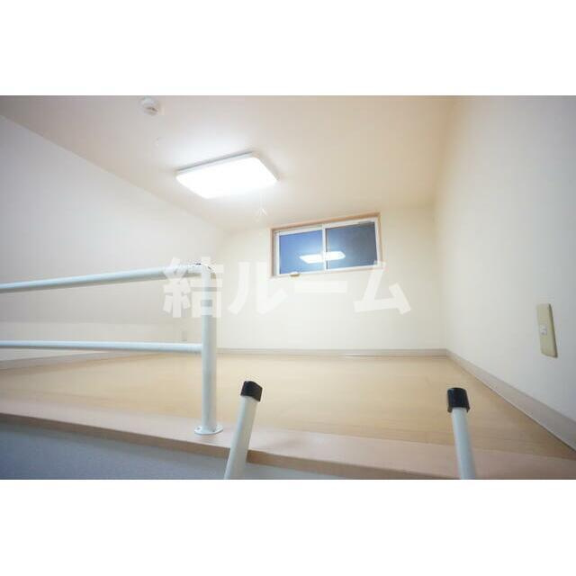 北区栄町のアパートの寝室